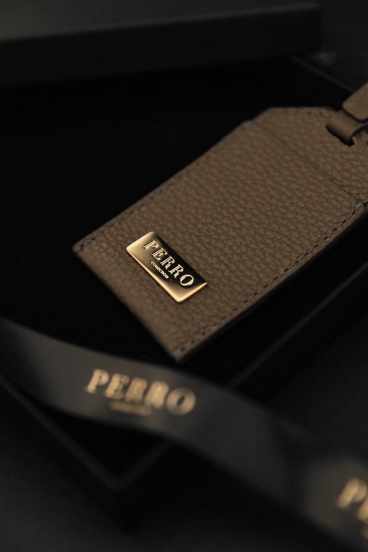 Leather dog poop bag holders by Perro Collection, handcrafted in Italy